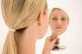 face in mirror